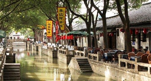 业绩补偿难收回，金安国纪收关注函，去年三季报净利大幅下滑